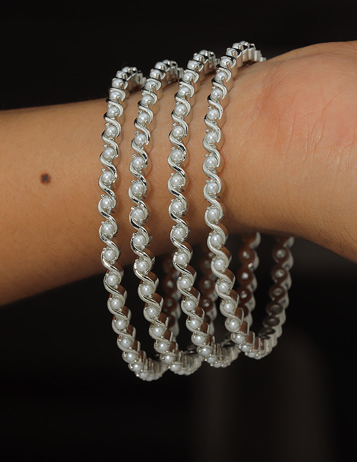 Designer Zirconia Rhodium Polish set of 4 Bangles