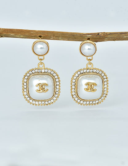 Fancy Zirconia Mother Of Pearl Drop Earrings